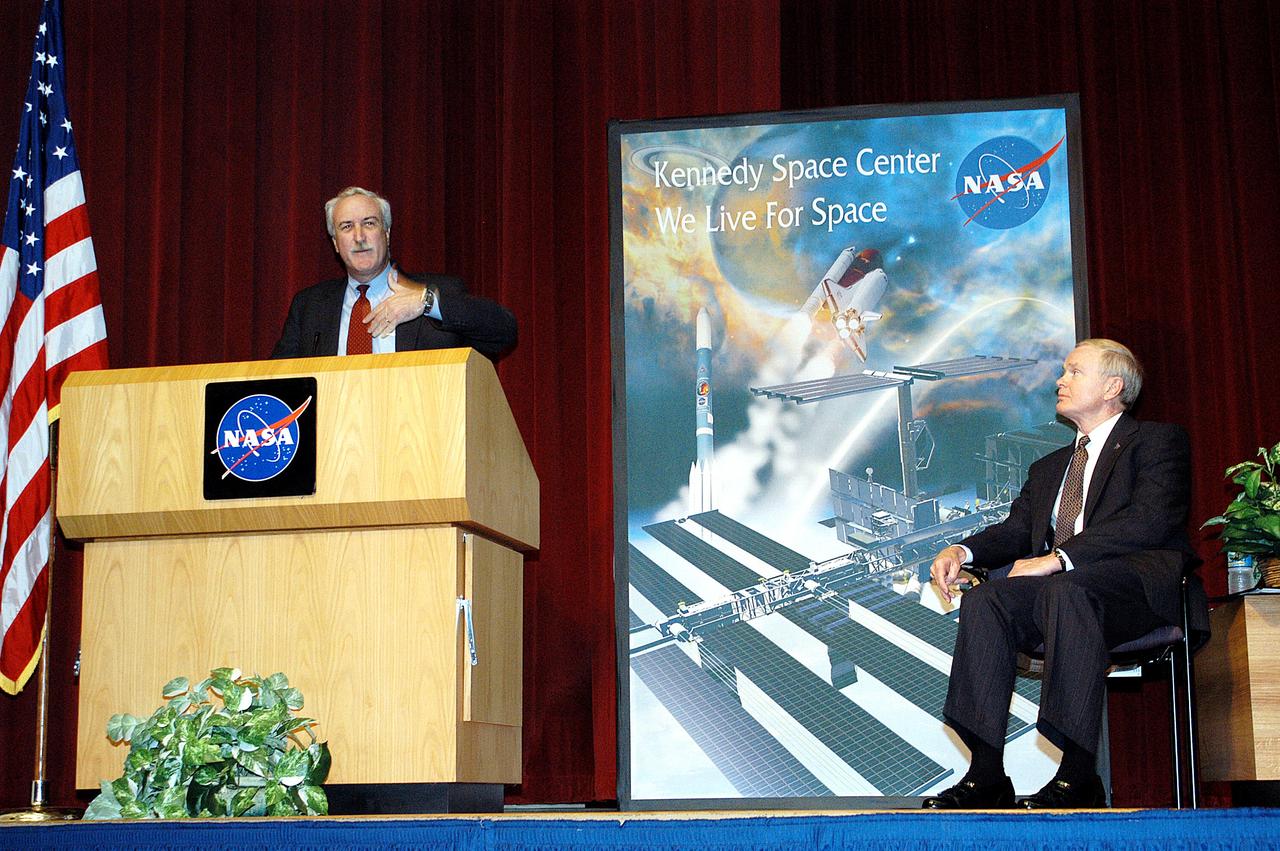 KENNEDY SPACE CENTER, FLA. -  NASA Administrator Sean O'Keefe addresses a group of KSC employees assembled in the KSC Training Auditorium. KSC Director Roy D. Bridges (right) also spoke.  The occasion is the announcement of James W. Kennedy as the next director of the NASA Kennedy Space Center (KSC) in Florida. Kennedy has served as KSC's deputy director since November 2002. He will succeed Bridges, who was appointed on June 13 to lead NASA's Langley Research Center, Hampton, Va.