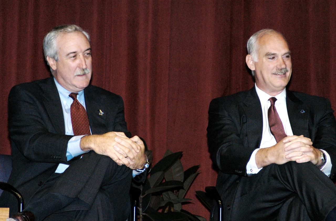 KENNEDY SPACE CENTER, FLA. -  NASA Administrator Sean O'Keefe (left) and NASA Associate Administrator of Space Flight William F. Readdy address a group of KSC employees assembled in the KSC Training Auditorium. The occasion is the announcement of James W. Kennedy as the next director of the NASA Kennedy Space Center (KSC) in Florida. Kennedy has served as KSC's deputy director since November 2002. He will succeed KSC Director Roy D. Bridges, who was appointed on June 13 to lead NASA's Langley Research Center, Hampton, Va.