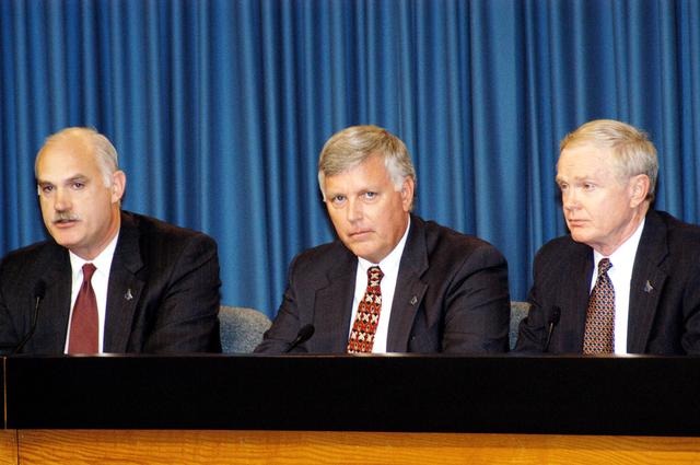NASA image: KENNEDY SPACE CENTER, FLA. -  NASA officials participate in a press conference in KSC's Press Site Auditorium. From left are NASA Associate Administrator for Space Flight William F. Readdy, KSC Deputy Director James W. Kennedy, and KSC Director Roy D. Bridges. The press conference followed the official announcement of Kennedy as the next director of the NASA Kennedy Space Center (KSC) in Florida. Kennedy has served as KSC's deputy director since November 2002. He will succeed Bridges, who was appointed on June 13 to lead NASA's Langley Research Center, Hampton, Va.