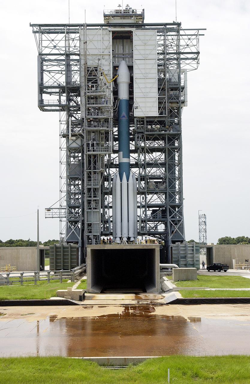 KENNEDY SPACE CENTER, FLA. -  The Mobile Service Tower is rolled back at Space Launch Complex 17B, Cape Canaveral Air Force Station, to reveal the Delta II Heavy launch vehicle ready for launch of the Mars Exploration Rover-B (MER-B) mission, with the rover "Opportunity" aboard. The second of twin rovers being sent to Mars, it is equipped with a robotic arm, a drilling tool, three spectrometers, and four pairs of cameras that allow it to have a human-like, 3D view of the terrain. Each rover could travel as far as 100 meters in one day to act as Mars scientists' eyes and hands, exploring an environment where humans are not yet able to go. MER-B is scheduled to launch on June 28 at one of two available times, 11:56:16 p.m. EDT or 12:37:59 a.m. EDT on June 29.