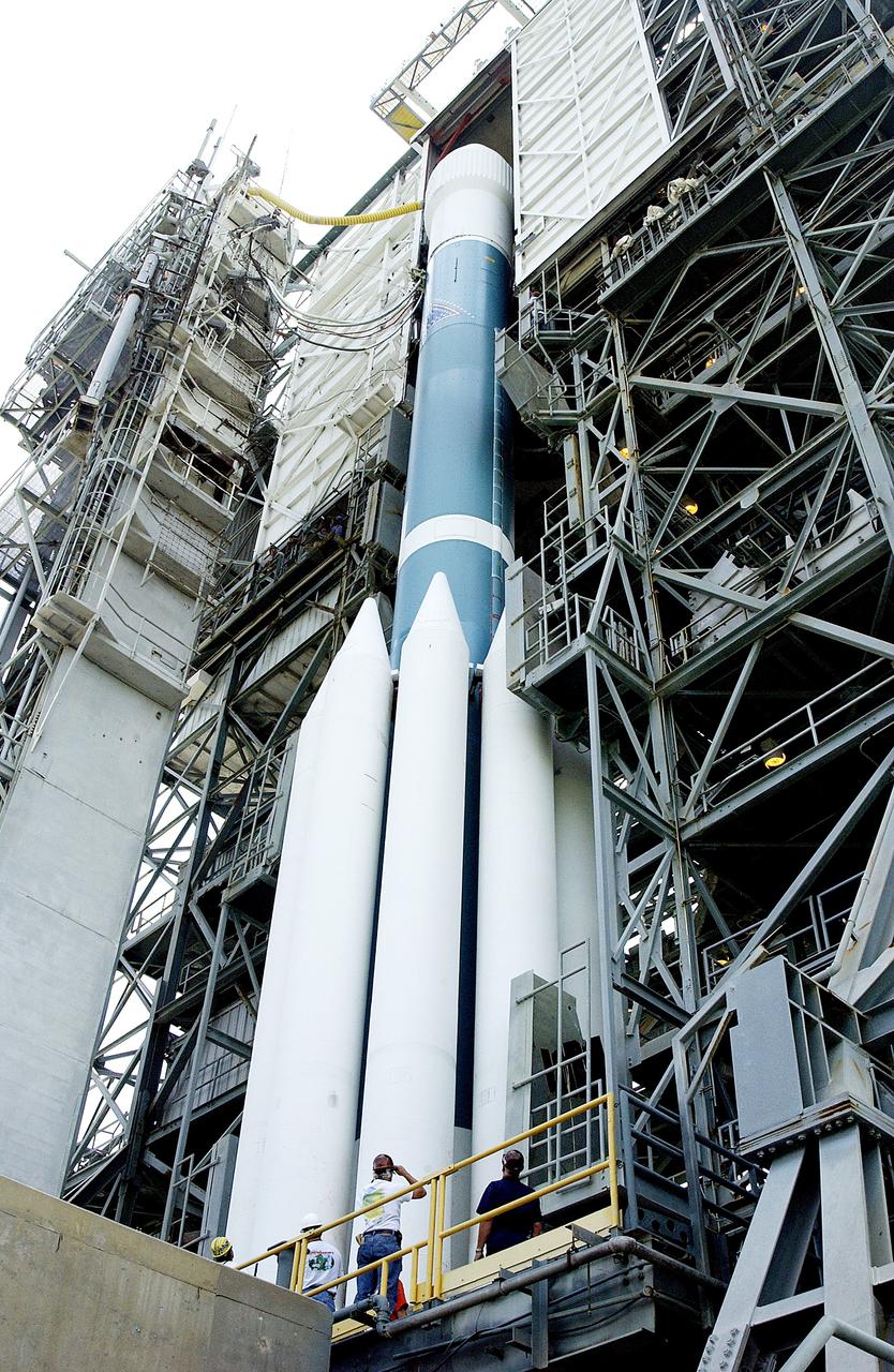 KENNEDY SPACE CENTER, FLA. -  The Mobile Service Tower is rolled back at Space Launch Complex 17B, Cape Canaveral Air Force Station, to reveal the Delta II Heavy launch vehicle ready for launch of the Mars Exploration Rover-B (MER-B) mission, with the rover "Opportunity" aboard. The second of twin rovers being sent to Mars, it is equipped with a robotic arm, a drilling tool, three spectrometers, and four pairs of cameras that allow it to have a human-like, 3D view of the terrain. Each rover could travel as far as 100 meters in one day to act as Mars scientists' eyes and hands, exploring an environment where humans are not yet able to go. MER-B is scheduled to launch on June 28 at one of two available times, 11:56:16 p.m. EDT or 12:37:59 a.m. EDT on June 29.
