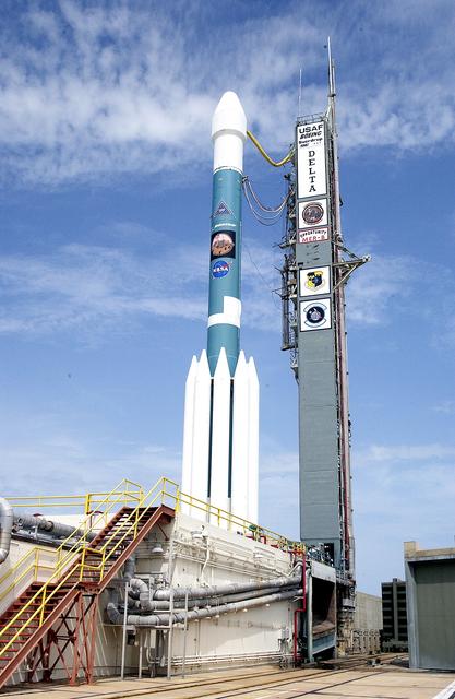 NASA image: KENNEDY SPACE CENTER, FLA. -  The Mobile Service Tower is rolled back at Space Launch Complex 17B, Cape Canaveral Air Force Station, to reveal the Delta II Heavy launch vehicle ready for launch of the Mars Exploration Rover-B (MER-B) mission, with the rover "Opportunity" aboard. The second of twin rovers being sent to Mars, it is equipped with a robotic arm, a drilling tool, three spectrometers, and four pairs of cameras that allow it to have a human-like, 3D view of the terrain. Each rover could travel as far as 100 meters in one day to act as Mars scientists' eyes and hands, exploring an environment where humans are not yet able to go. MER-B is scheduled to launch on June 28 at one of two available times, 11:56:16 p.m. EDT or 12:37:59 a.m. EDT on June 29.