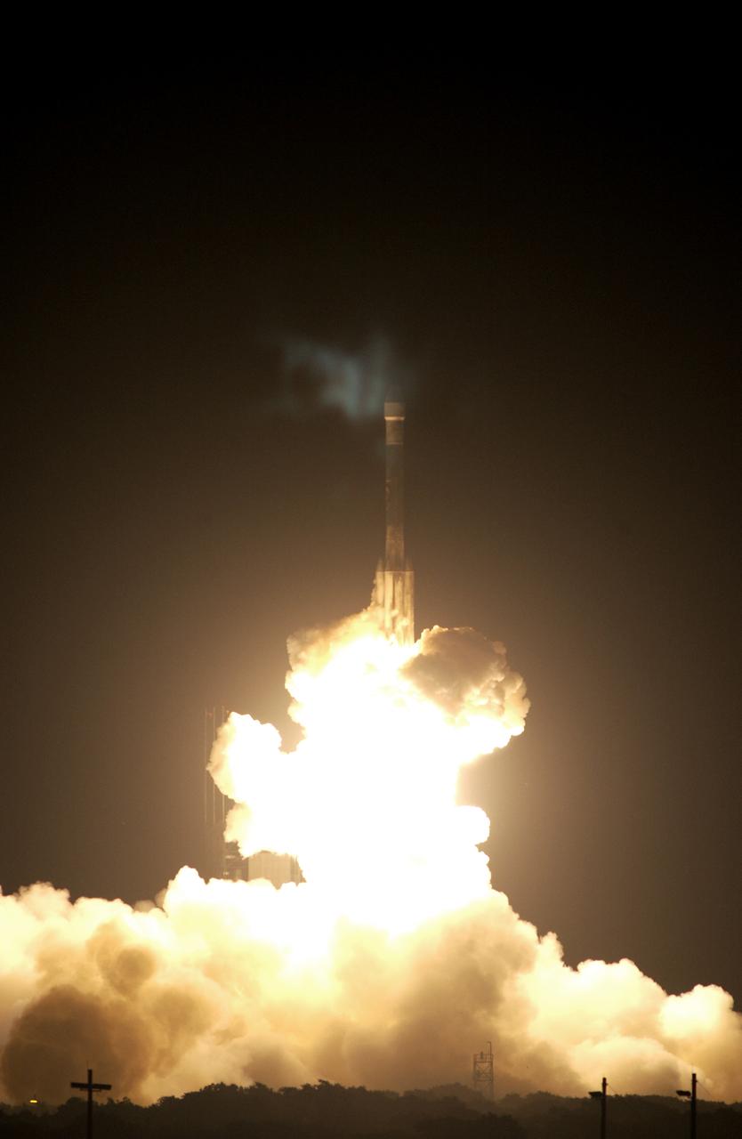 On Launch Complex 17-B, Cape Canaveral Air Force Station, the Delta II Heavy launch vehicle carrying the rover "Opportunity" for the second Mars Exploration Rover mission launches at 11:18:15 p.m. EDT. Opportunity will reach Mars on Jan. 25, 2004. Together the two MER rovers, Spirit (launched June 10) and Opportunity, seek to determine the history of climate and water at two sites on Mars where conditions may once have been favorable to life. The rovers are identical. They will navigate themselves around obstacles as they drive across the Martian surface, traveling up to about 130 feet each Martian day. Each rover carries five scientific instruments including a panoramic camera and microscope, plus a rock abrasion tool that will grind away the outer surfaces of rocks to expose their interiors for examination. Each rover’s prime mission is planned to last three months on Mars.
