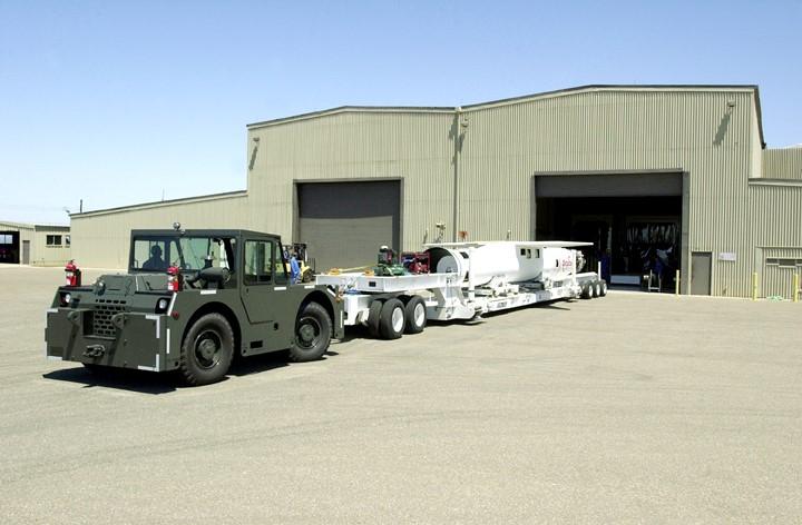 KENNEDY SPACE CENTER, FLA. - At Vandenberg Air Force Base, Calif., the Pegasus launch vehicle is moved into its hangar.  The Pegasus will carry the SciSat-1 spacecraft in a 400-mile-high polar orbit to investigate processes that control the distribution of ozone in the upper atmosphere.  The scientific mission of SciSat-1 is to measure and understand the chemical processes that control the distribution of ozone in the Earth’s atmosphere, particularly at high altitudes.  The data from the satellite will provide Canadian and international scientists with improved measurements relating to global ozone processes and help policymakers assess existing environmental policy and develop protective measures for improving the health of our atmosphere, preventing further ozone depletion.  The mission is designed to last two years.
