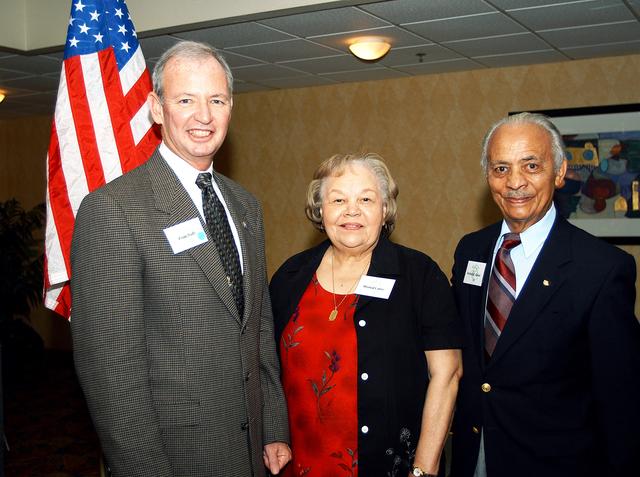 NASA image: KENNEDY SPACE CENTER, FLA. - (From left) Brian Duffy, Lockheed Martin vice president/associate program manager, Mildred Carter and Col. (Ret.) Herbert E. Carter, one of the Tuskegee Airmen, attend a dinner sponsored by the KSC Spaceflight and Life Sciences Office.  Col. Carter was a guest speaker at the dinner.