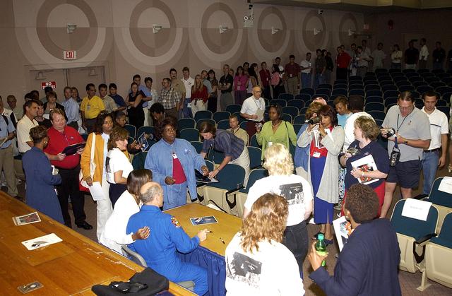 NASA image: KENNEDY SPACE CENTER, FLA. -   Expedition 6 Commander Ken Bowersox poses for a photo with KSC employees after his presentation about his mission and residence on the International Space Station from November 25, 2002, to May 3, 2003.