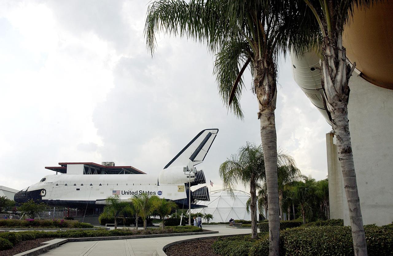 KENNEDY SPACE CENTER, FLA. - One of the featured displays at the KSC Visitor Complex is the genuine external tank (center) with twin solid rocket boosters, seen here at the lower end. The tank and boosters are paired with a full-size replica of a Space Shuttle Orbiter in the Shuttle Plaza.