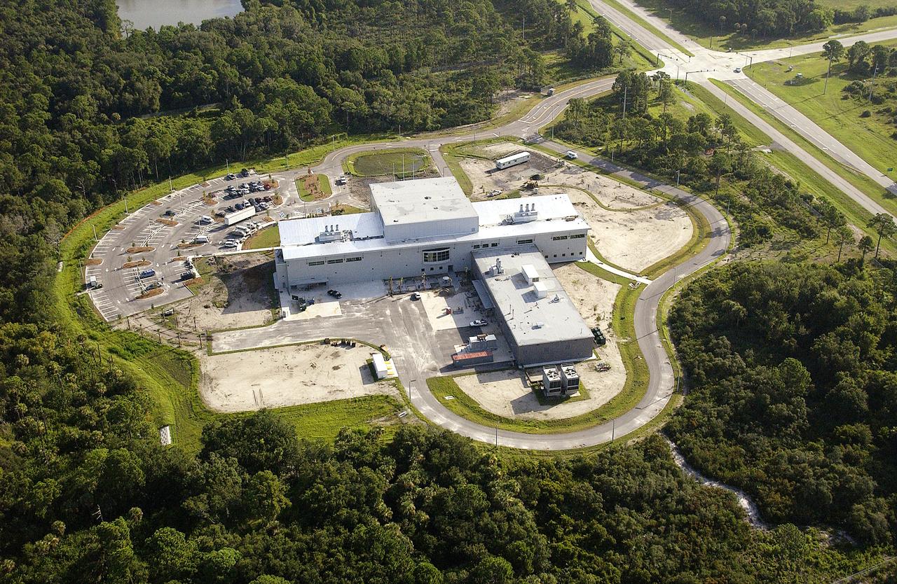 The Space Experiment Research and Processing Laboratory (SERPL) is a major new research facility under construction at the International Space Research Park located on KSC. At right is S.R. 3, which leads into the Center from Merritt Island. Being developed as a partnership between KSC and the State of Florida, SERPL will serve as the primary gateway to the International Space Station for science experiments and as a world-class home to ground-based investigations in fundamental and applied biological science. NASA’s life sciences contractor will be the primary tenant of the facility, leasing space to conduct flight experiment processing and NASA-sponsored research. About 20 percent of the facility will be available for use by Florida’s university researchers through the Florida Space Research Institute.