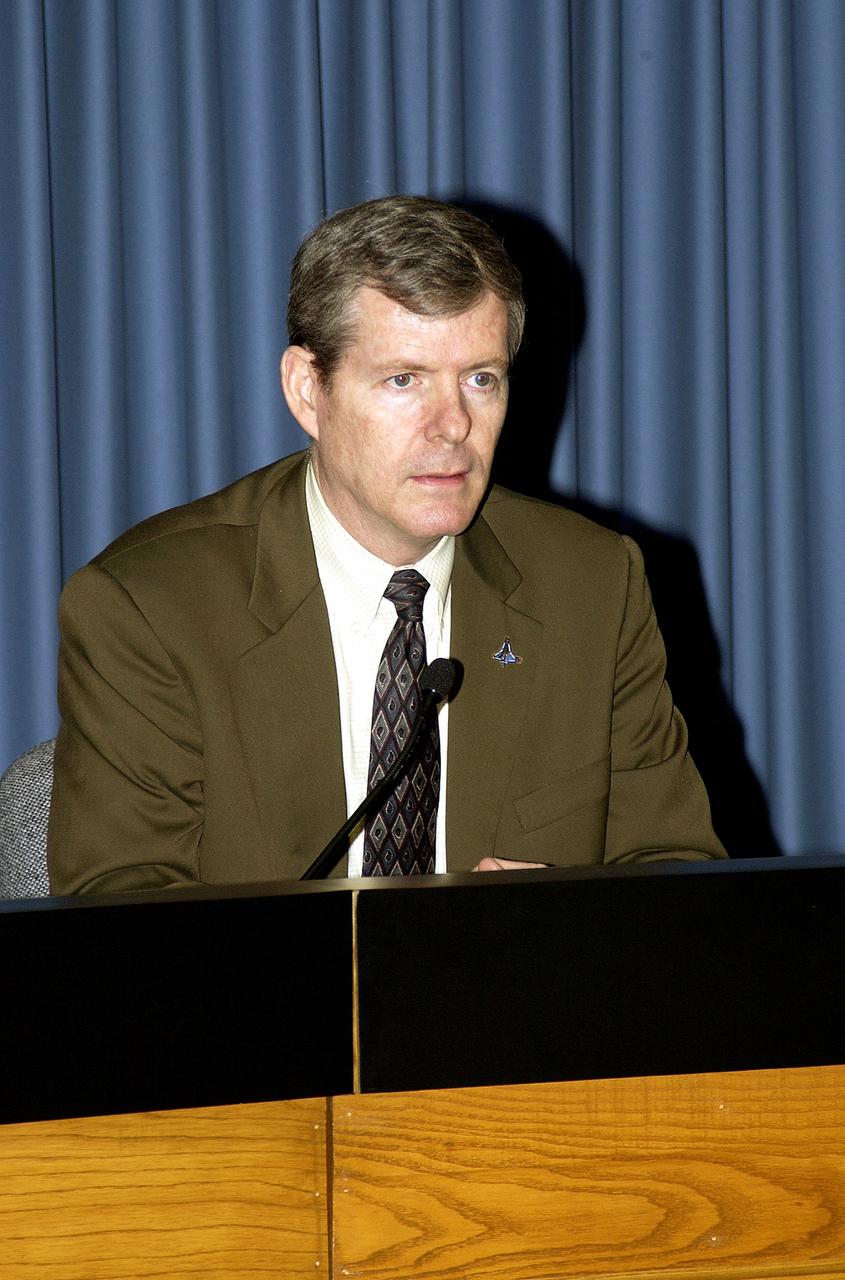 KENNEDY SPACE CENTER, FLA.  -  Associate Administrator for Safety and Mission Assurance Bryan O’Connor  speaks at a media briefing at KSC.  NASA officials discussed the agency’s human space flight program.  Others on the panel were NASA Deputy Administrator Fred Gregory and Associate Administrator for Space Flight Bill Readdy
