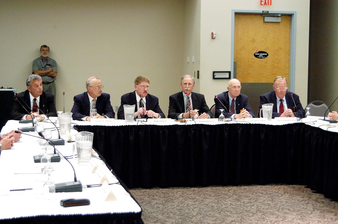 KENNEDY SPACE CENTER, FLA.  -  The Return To Flight Task Group (RTFTG) holds the first public meeting at the Debus Center, KSC Visitor Complex.  Members and staff at this table, from left, are Joseph W. Cuzzupolui, retired Army Col. James C. Adamson, David Lenyel, co-chairs Richard O. Covey and retired Air Force Lt. Gen. Thomas Stafford, and retired Air Force Maj. Gen. Ralph H. Jacobson.  Covey is a former astronaut and Shuttle commander.  Stafford is a former astronaut and Apollo commander.  The RTFTG was at KSC to conduct organizational activities, tour Space Shuttle facilities and receive briefings on Shuttle-related topics.  The task group was chartered by NASA Administrator Sean O’Keefe to perform an independent assessment of NASA’s implementation of the final recommendations of the Columbia Accident Investigation Board.
