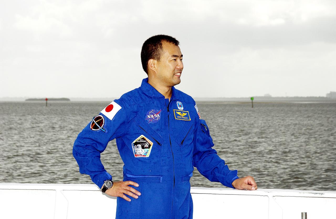 KENNEDY SPACE CENTER, FLA. -  STS-114 Mission Specialist Soichi Noguchi, who is with the Japanese space agency NASDA, poses on the deck of one of the SRB Retrieval Ships docked at Hangar AF on the Banana River.  He and other crew members Commander Eileen Collins, Pilot James Kelly and Mission Specialist Stephen Robinson toured the ships.  Mission STS-114 will carry the MultiPurpose Logistics Module (MPLM) Raffaello and External Stowage Platform 2 to the International Space Station.  The MPLM will contain supplies and equipment.  Another goal of the mission is to remove and replace a Control Moment Gyro.  Launch date for mission STS-114 is under review.