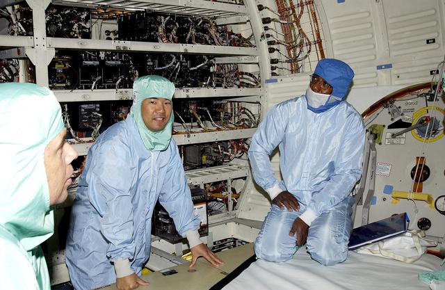 NASA image: KENNEDY SPACE CENTER, FLA. -   In the midbody of orbiter Atlantis, STS-114 crew members look over equipment under the eyes of a technician.  At left are Pilot James Kelly and Mission Specialist Soichi Noguchi.  They and Commander Eileen Collins and Mission Specialist Stephen Robinson are at KSC for equipment familiarization.  Noguchi is with the Japanese space agency NASDA.  Mission STS-114 will carry the MultiPurpose Logistics Module (MPLM) Raffaello and External Stowage Platform 2 to the International Space Station.  The MPLM will contain supplies and equipment.  Another goal of the mission is to remove and replace a Control Moment Gyro.  Launch date for mission STS-114 is under review.