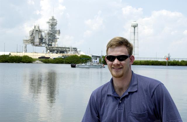 NASA image: KENNEDY SPACE CENTER, FLA.  -  Justin Manley, of the National Oceanic and Atmospheric Administration, is a member of the research team conducting underwater acoustic research in the Launch Complex 39 turn basin near Launch Pad 39A.  Several government agencies, including NASA, NOAA, the Navy, the Coast Guard, and the Florida Fish and Wildlife Commission are involved in the testing. The research involves demonstrations of passive and active sensor technologies, with applications in fields ranging from marine biological research to homeland security. The work is also serving as a pilot project to assess the cooperation between the agencies involved. Equipment under development includes a passive acoustic monitor developed by NASA’s Jet Propulsion Laboratory, and mobile robotic sensors from the Navy’s Mobile Diving and Salvage Unit.