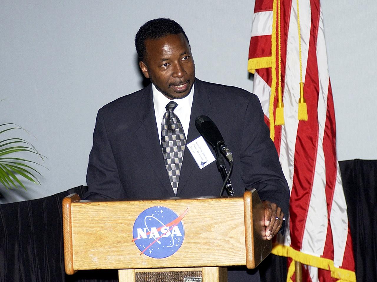 KENNEDY SPACE CENTER, FLA.  -  KSC’s incoming  Deputy Director Woodrow Whitlow speaks to employees and guests during the rollout at KSC of the Agency initiative One NASA .   The event was held at the IMAX Theater® where NASA leaders discussed One NASA with selected employees.  Explaining how their respective centers contribute to One NASA, along with Whitlow, were KSC Director Jim Kennedy; James Jennings,  NASA’s associate deputy administrator for institutions and asset management; Ed Weiler, associate administrator for Space Science; Kevin Peterson, Dryden Flight Research Center director; and implementation team lead Johnny Stevenson.   Glenn Research Center Director Dr. Julian Earls gave a motivational speech during the luncheon held at the Visitor Complex Debus Conference Center.