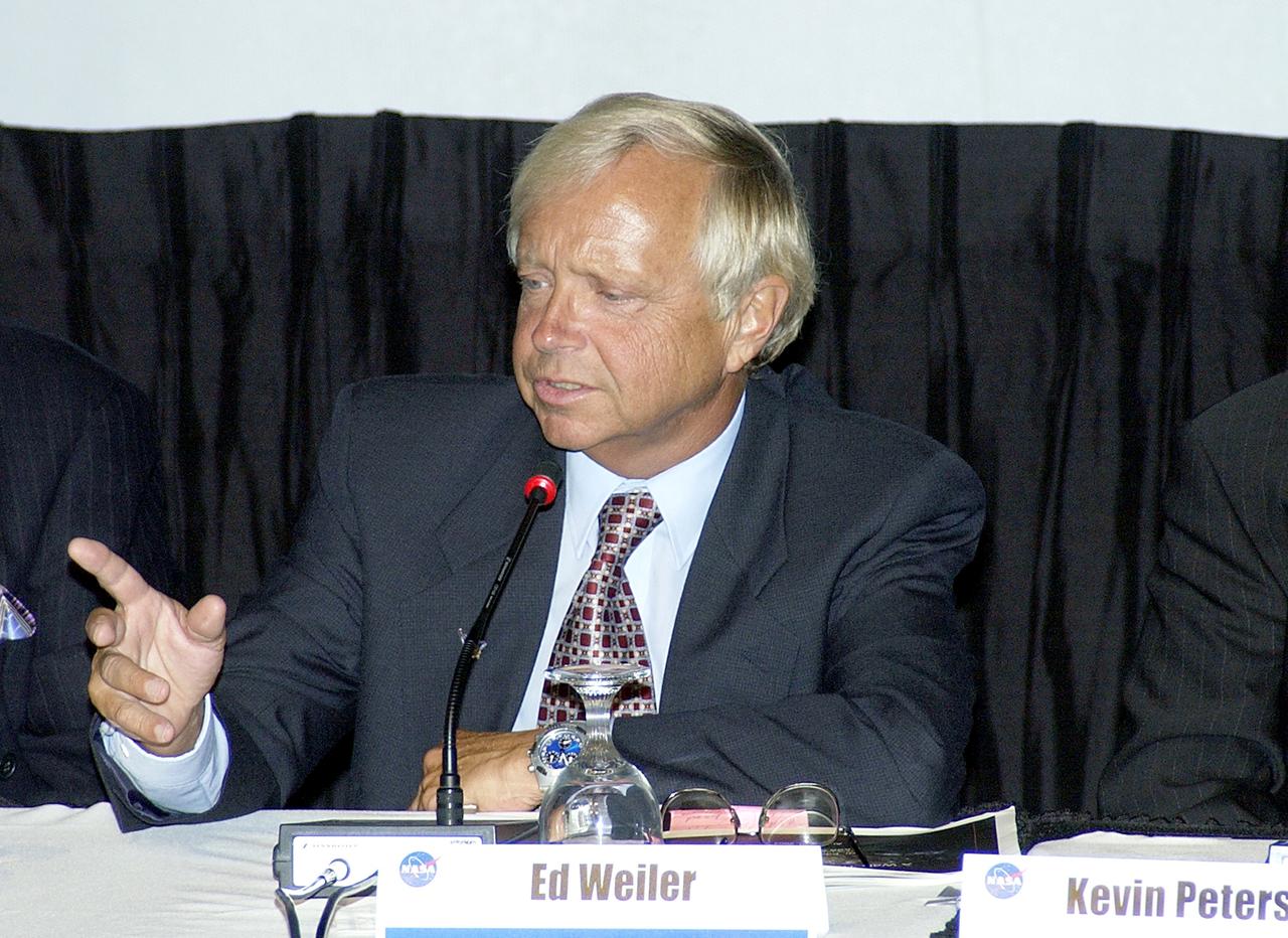 KENNEDY SPACE CENTER, FLA.  -  NASA’s Ed Weiler, associate administrator for Space Science, speaks to employees and guests during the rollout at KSC of the Agency initiative One NASA .   The event was held at the IMAX Theater®.  Explaining how their respective centers contribute to One NASA, along with Weiler, were KSC Director Jim Kennedy; James Jennings,  NASA’s associate deputy administrator for institutions and asset management; Kevin Peterson, Dryden Flight Research Center director;  incoming KSC Deputy Director Woodrow Whitlow; and implementation team lead Johnny Stevenson.   Glenn Research Center Director Dr. Julian Earls gave a motivational speech during the luncheon held at the Visitor Complex Debus Conference Center.