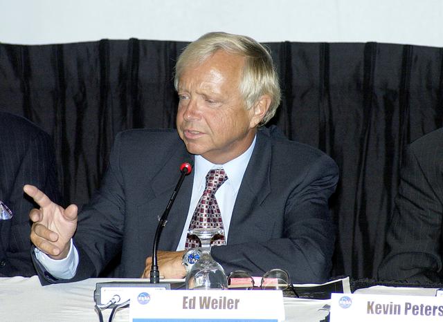 NASA image: KENNEDY SPACE CENTER, FLA.  -  NASA’s Ed Weiler, associate administrator for Space Science, speaks to employees and guests during the rollout at KSC of the Agency initiative One NASA .   The event was held at the IMAX Theater®.  Explaining how their respective centers contribute to One NASA, along with Weiler, were KSC Director Jim Kennedy; James Jennings,  NASA’s associate deputy administrator for institutions and asset management; Kevin Peterson, Dryden Flight Research Center director;  incoming KSC Deputy Director Woodrow Whitlow; and implementation team lead Johnny Stevenson.   Glenn Research Center Director Dr. Julian Earls gave a motivational speech during the luncheon held at the Visitor Complex Debus Conference Center.