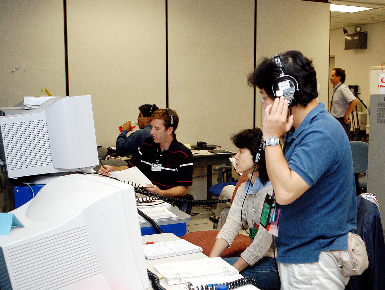 KENNEDY SPACE CENTER, FLA. - In the Space Station Processing Facility, Japanaese astronauts and personnel observe sensors during a Multi-Equipment Interface Test (MEIT) on the Japanese Experiment Module (JEM).  The National Space Development Agency of Japan (NASDA) developed the laboratory at the Tsukuba Space Center near Tokyo. It is the first element, named "Kibo" (Hope), to be delivered to KSC. The JEM is Japan's primary contribution to the Station. It will enhance the unique research capabilities of the orbiting complex by providing an additional environment for astronauts to conduct science experiments.