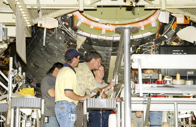 NASA image: Bill Parsons with Discovery Processing Team