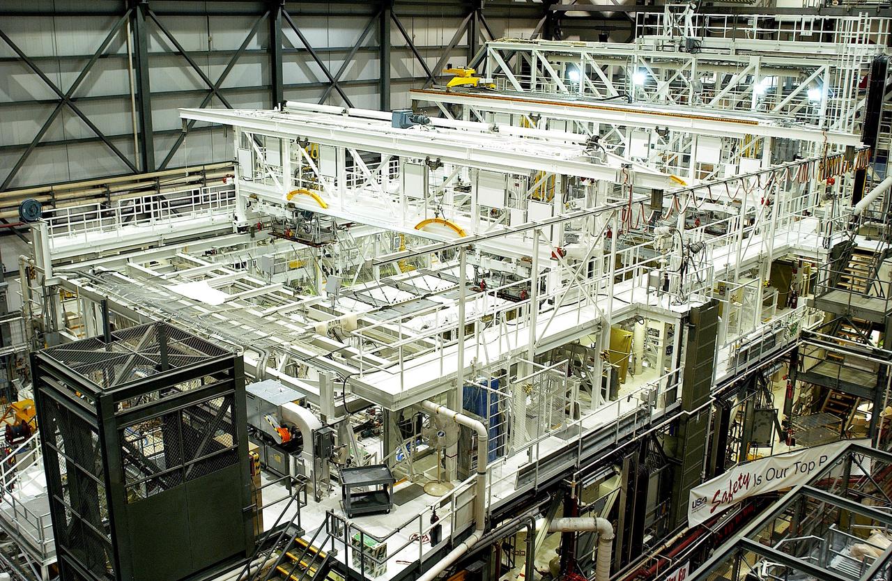 KENNEDY SPACE CENTER, FLA. -   Workstands at various levels surround the orbiter Endeavour in the Orbiter Processing Facility (OPF).  The OPF provides postflight servicing and checkout, as well as vehicle modifications.
