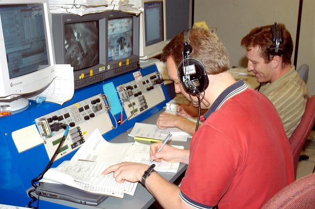 NASA image: KENNEDY SPACE CENTER, FLA. -   Technicians in the Space Station Processing Facility work on a Multi-Element Integrated Test (MEIT) of the U.S. Node 2 and the Japanese Experiment Module (JEM).   Node 2 attaches to the end of the U.S. Lab on the ISS and provides attach locations for the Japanese laboratory, European laboratory, the Centrifuge Accommodation Module and, eventually, Multipurpose Logistics Modules. It will provide the primary docking location for the Shuttle when a pressurized mating adapter is attached to Node 2.  Installation of the module will complete the U.S. Core of the ISS.   The JEM, developed by the National Space Development Agency of Japan (NASDA), is Japan's primary contribution to the Station. It will enhance the unique research capabilities of the orbiting complex by providing an additional environment for astronauts to conduct science experiments.