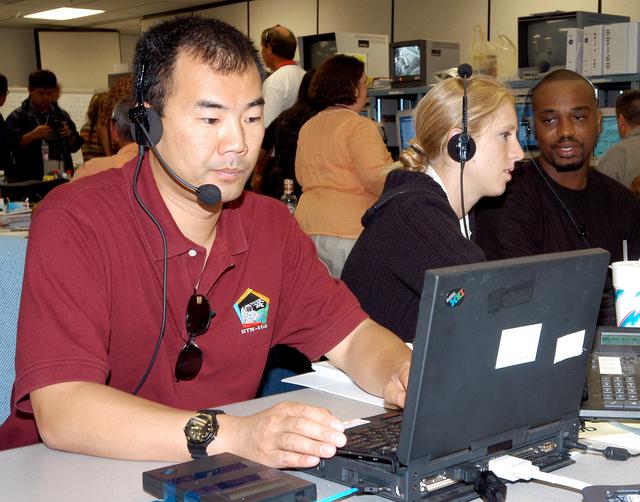 NASA image: KENNEDY SPACE CENTER, FLA. -   Astronaut Soichi Noguchi, with the National Space Development Agency of Japan (NASDA), works at a console during a Multi-Element Integrated Test (MEIT) of the U.S. Node 2 and the Japanese Experiment Module (JEM).  Noguchi is assigned to mission STS-114 as a mission specialist.   Node 2 attaches to the end of the U.S. Lab on the ISS and provides attach locations for the Japanese laboratory, European laboratory, the Centrifuge Accommodation Module and, eventually, Multipurpose Logistics Modules. It will provide the primary docking location for the Shuttle when a pressurized mating adapter is attached to Node 2.  Installation of the module will complete the U.S. Core of the ISS.   The JEM, developed by NASDA,  is Japan's primary contribution to the Station. It will enhance the unique research capabilities of the orbiting complex by providing an additional environment for astronauts to conduct science experiments.