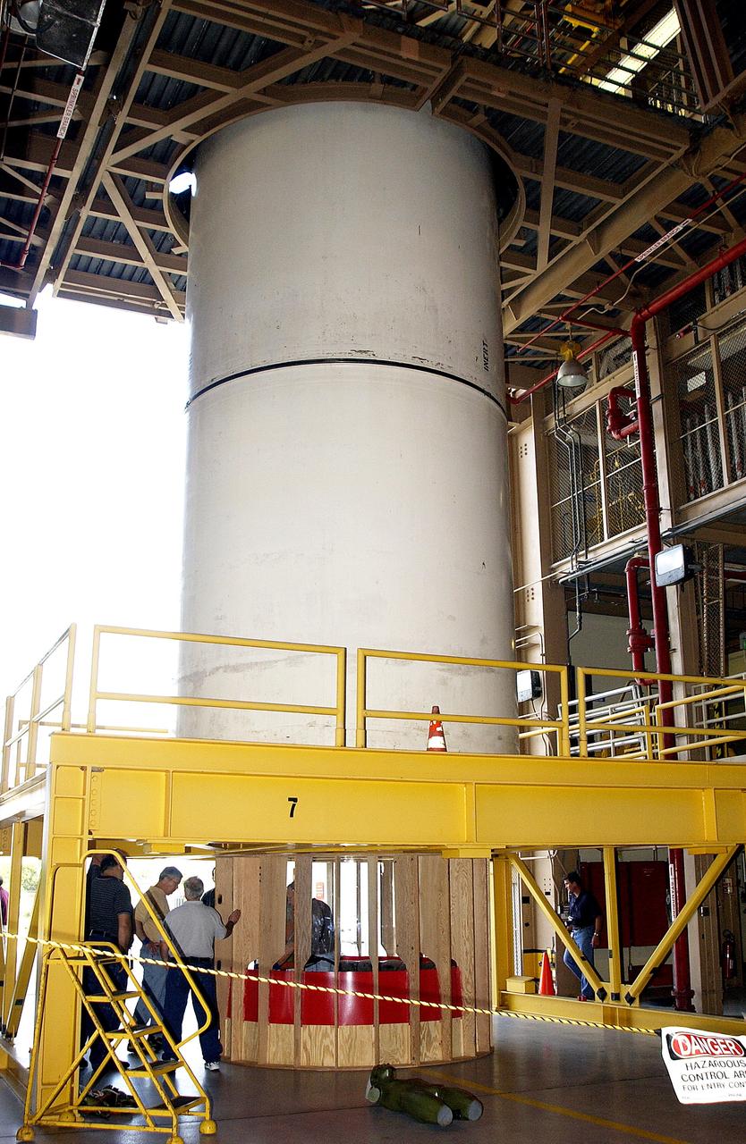 KENNEDY SPACE CENTER, FLA. -  At the Rotation, Processing and Surge Facility stand a mockup of two segments of a solid rocket booster (SRB) being used to test the feasibility of a vertical SRB propellant grain inspection, required as part of safety analysis.