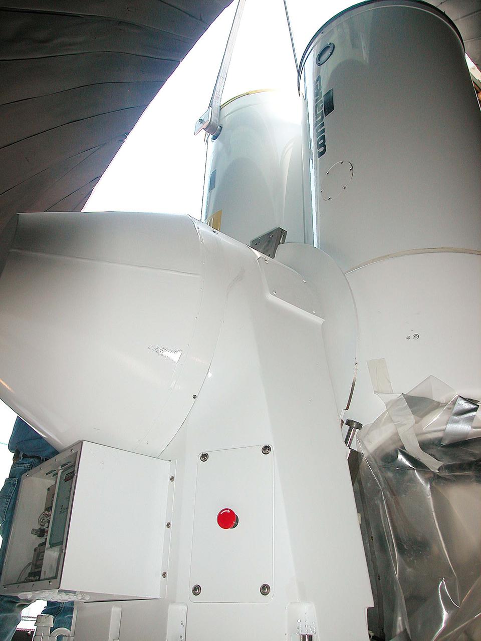 Seen from inside the dome, a new five-meter telescope is lowered into place. The tracking telescope is part of the Distant Object Attitude Measurement System (DOAMS) in Cocoa Beach, Fla., that provides optical support for launches from KSC and Cape Canaveral. 