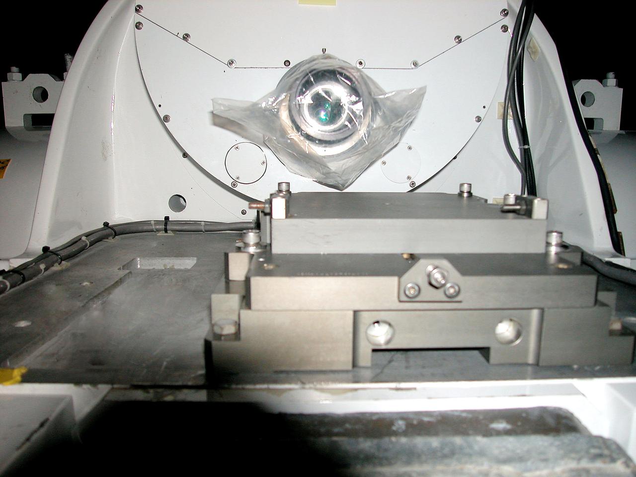 KENNEDY SPACE CENTER, FLA. -    A film camera is set in place  on a newly installed five-meter focal length telescope in Cocoa Beach, Fla.  The tracking telescope is part of the Distant Object Attitude Measurement System (DOAMS) that provides optical support for launches from KSC and Cape Canaveral.