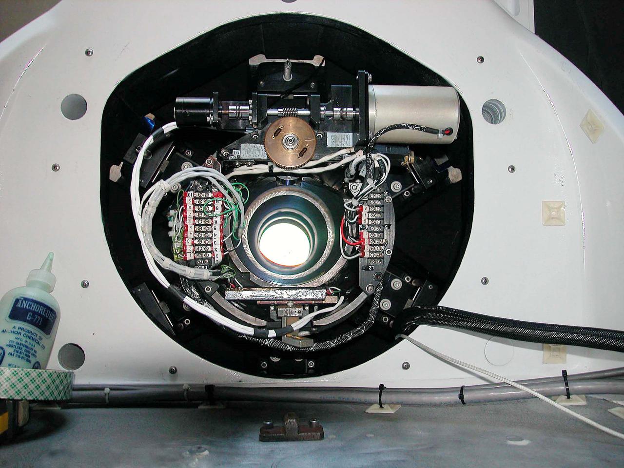 KENNEDY SPACE CENTER, FLA. -    The focus barrel is installed  on a newly installed five-meter focal length telescope in Cocoa Beach, Fla.  The tracking telescope is part of the Distant Object Attitude Measurement System (DOAMS) that provides optical support for launches from KSC and Cape Canaveral.