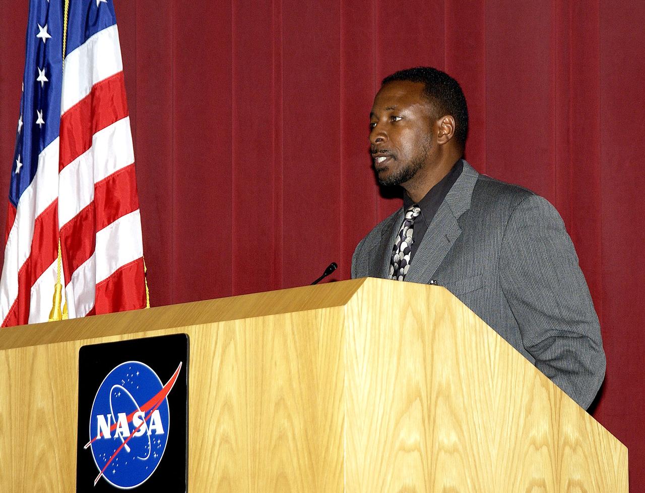 KENNEDY SPACE CENTER, FLA. -  Dr. Woodrow Whitlow Jr., KSC deputy director, speaks to employees during  Center Director Jim Kennedy’s first all-hands meeting for employees.  Also on the agenda was Tim Wilson, assistant chief engineer for Shuttle, and Bill Pickavance, vice president and deputy program manager, Florida operations, United Space Alliance..  Representatives from the Shuttle program and contractor team were on hand to discuss the Columbia Accident Investigation Board report and where KSC stands in its progress toward return to flight.