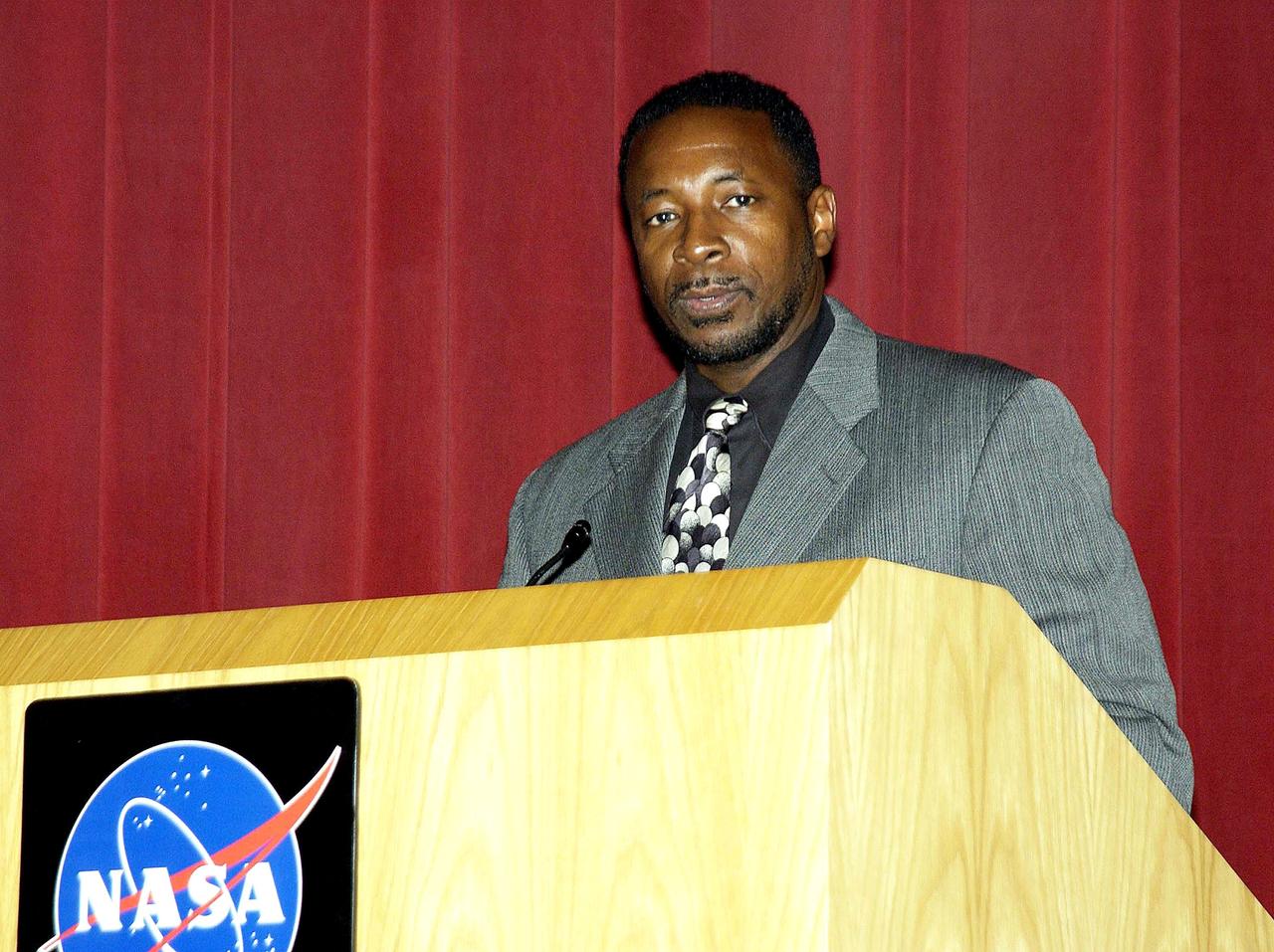 KENNEDY SPACE CENTER, FLA. -  Dr. Woodrow Whitlow Jr., KSC deputy director, speaks to employees during Center Director Jim Kennedy’s first all-hands meeting for employees.  Also on the agenda was Tim Wilson, assistant chief engineer for Shuttle, and Bill Pickavance, vice president and deputy program manager, Florida operations, United Space Alliance..  Representatives from the Shuttle program and contractor team were on hand to discuss the Columbia Accident Investigation Board report and where KSC stands in its progress toward return to flight.