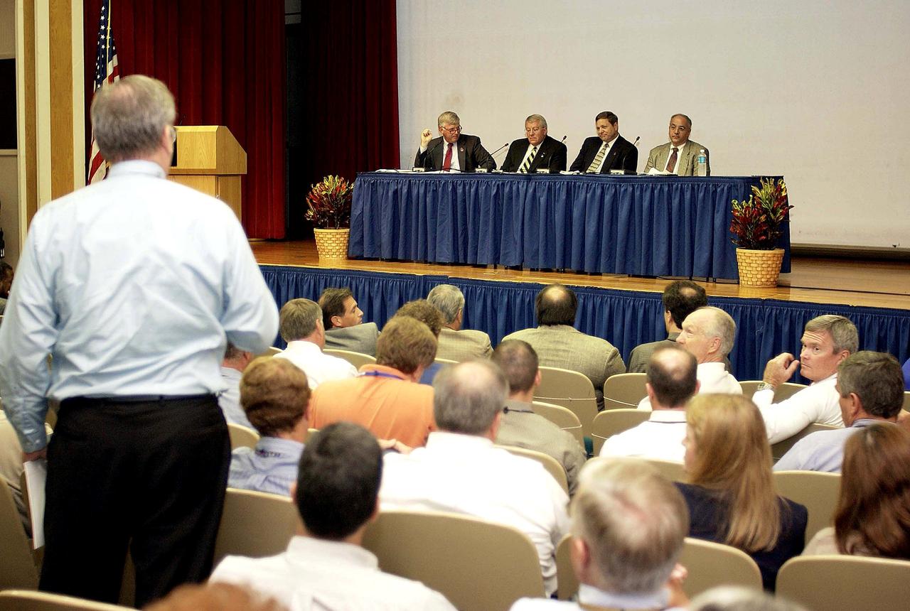 KENNEDY SPACE CENTER, FLA. -  Representatives from the Shuttle program and contractor team are part of Center Director Jim Kennedy’s first all-hands meeting for employees. From left are Kennedy, Bill Pickavance, Mike Wetmore and Bert Garrido.   They were on hand to discuss the Columbia Accident Investigation Board report and where KSC stands in its progress toward return to flight.