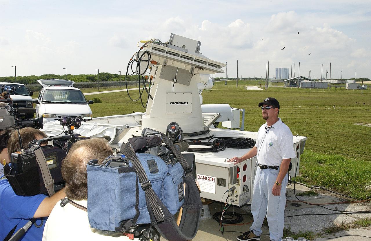 At the launch pad perimeter camera site at Launch Complex 39B, news media representatives are briefed on the improved tracking cameras that will be used to capture ascent imagery during the return to flight of the Space Shuttle. The press opportunity also includes tours of the Image Analysis Facility in the Vehicle Assembly Building and two Playalinda Beach optical tracking sites at the Cape Canaveral National Seashore and the Merritt Island National Refuge.