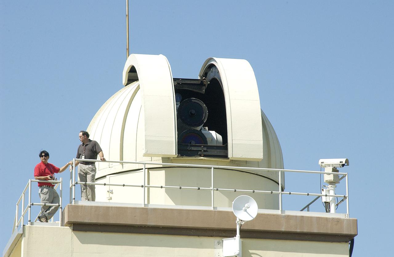 Inside the dome seen here is a tracking telescope that provides optical support for launches from KSC and Cape Canaveral. The telescope is part of the Distant Object Attitude Measurement System (DOAMS), which includes improved tracking cameras and long-range optical tracking systems that will be used to capture ascent imagery during the return to flight of the Space Shuttle.