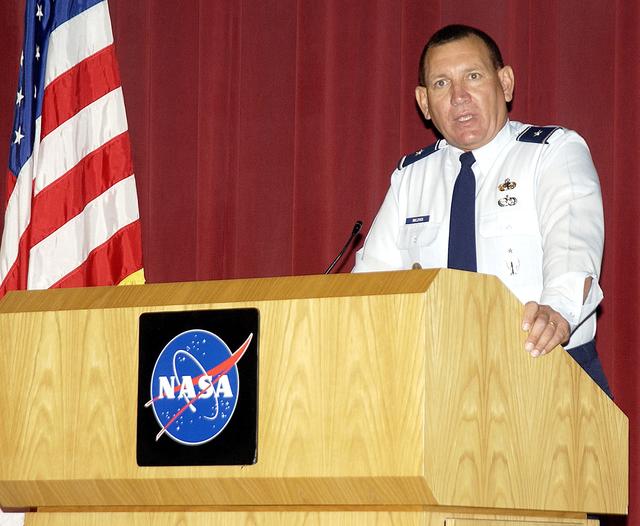 KENNEDY SPACE CENTER, FLA. - Brig. Gen. J. Gregory Pavlovich, 45th Space Wing, speaks to the employees and guests gathered in the KSC Training Auditorium for Spaceport Super Safety and Health Day.  The kickoff presentation also included speakers Maj. Gen. Kevin Chilton and Capt. Charles Plumb (USNR retired), who spoke about his experiences in the Navy and as a prisoner of war in Vietnam.  Spaceport Super Safety and Health Day is an annual event at KSC and Cape Canaveral Air Force Station dedicated to reinforcing safe and healthful behaviors in the workforce.  Safety Awards were also given to individuals and groups.