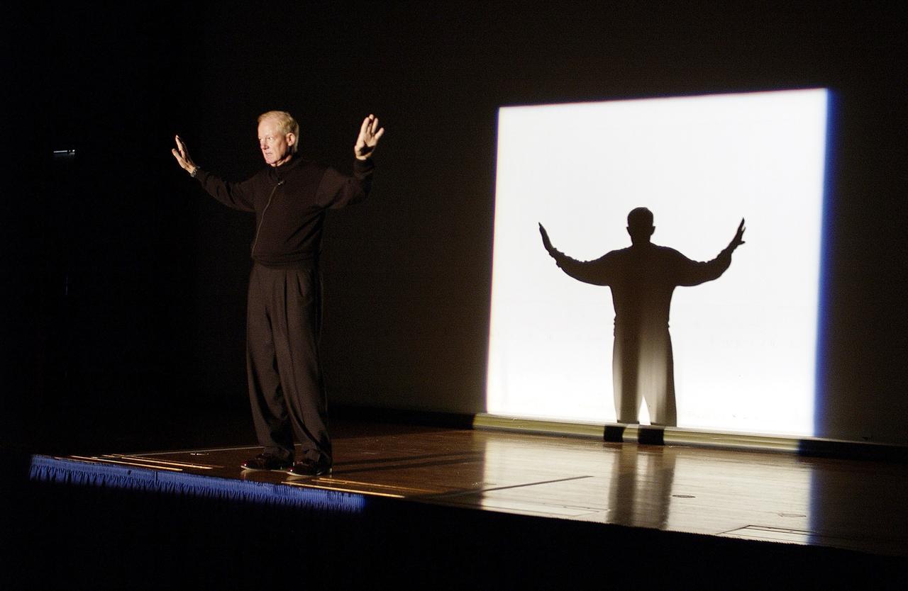 KENNEDY SPACE CENTER, FLA. - Capt. Charles Plumb (USNR retired) begins his dramatic presentation of his six years as a prisoner of war in Vietnam.   The block of light on the stage represented the size of the cell he was confined in.  Plumb was keynote speaker for the kickoff of Spaceport Super Safety and Health Day at KSC, an annual event dedicated to reinforcing safe and healthful behaviors in the workforce.