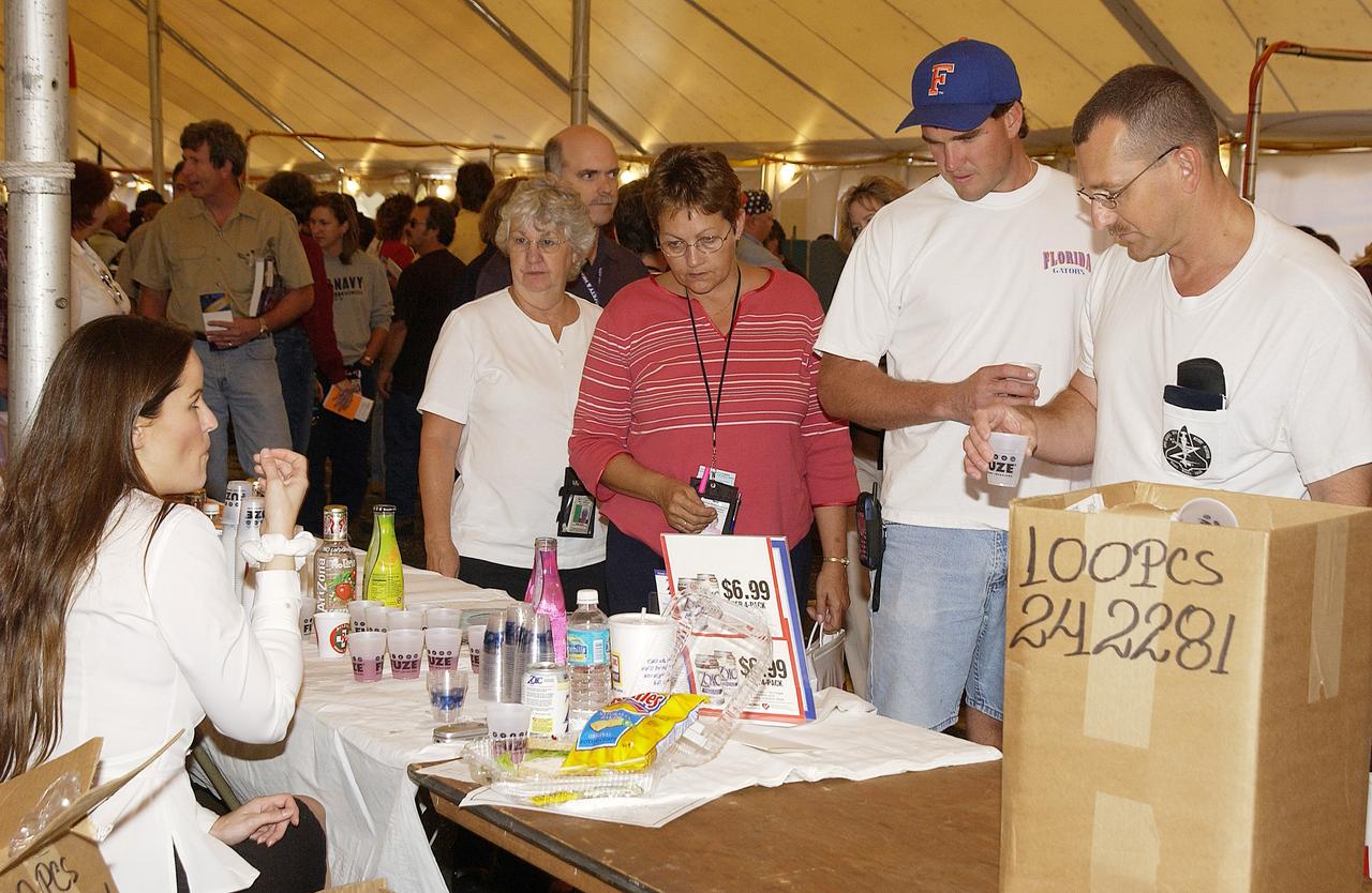 KENNEDY SPACE CENTER, FLA. -   One of many vendors displaying their products during the Spaceport Super Safety and Health Day at KSC and Cape Canaveral Air Force Station, Florida Power and Light draws a crowd during a demonstration.  The annual KSC event is dedicated to reinforcing safe and healthful behaviors in the workforce.