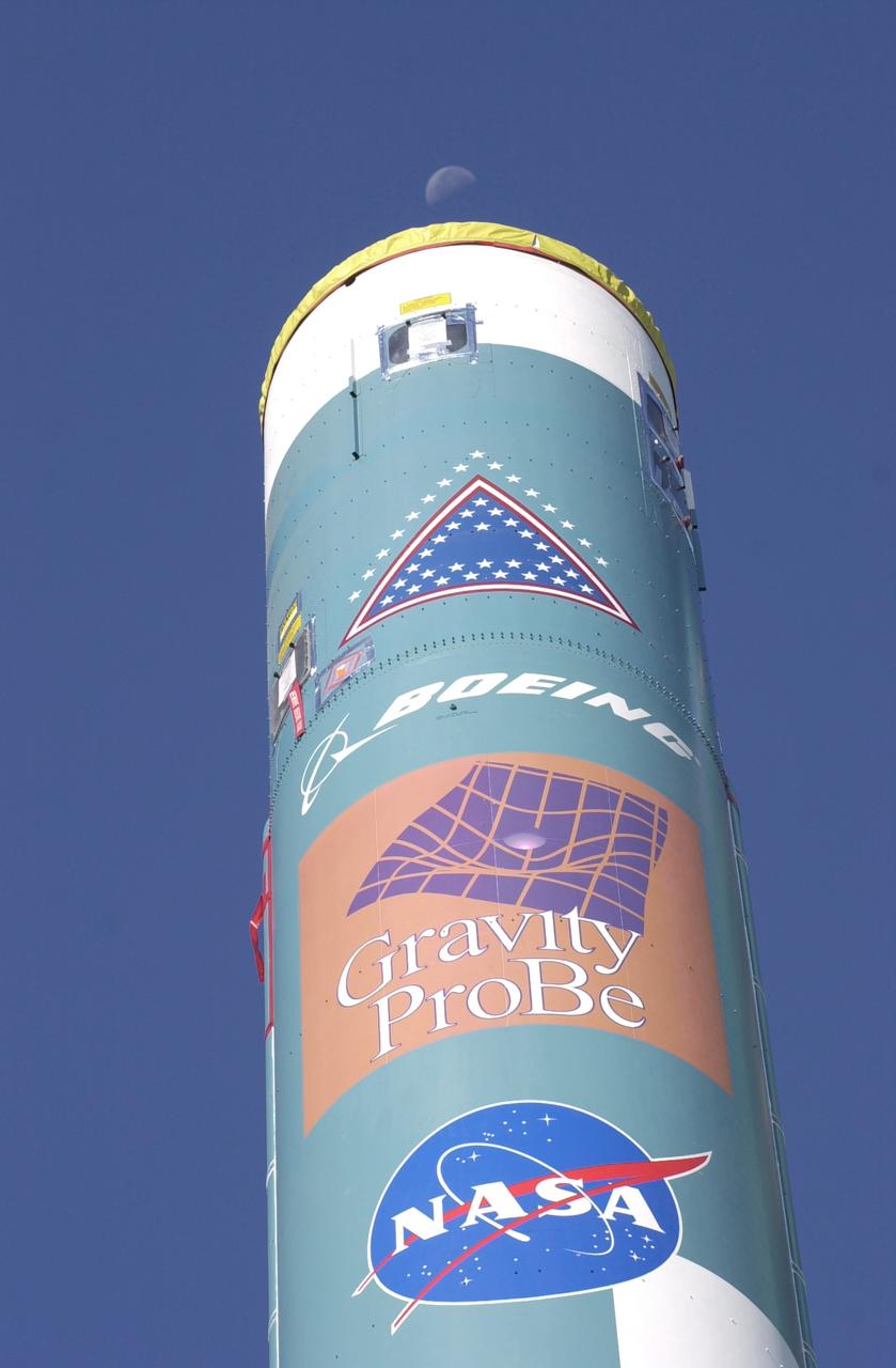 VANDENBERG AFB, CALIF. -  Logos identify the mission of this Delta II rocket that will launch the Gravity Probe B experiment, developed by Stanford University, Lockheed Martin and NASA’s Marshall Space Flight Center.   The Gravity Probe B will launch a payload of four gyroscopes into low-Earth polar orbit to test two extraordinary predictions of Albert Einstein’s general theory of relativity: the geodetic effect (how space and time are warped by the presence of the Earth) and frame dragging (how Earth’s rotation drags space and time around with it). Once in orbit, for 18 months each gyroscope’s spin axis will be monitored as it travels through local spacetime, observing and measuring these effects. The targeted launch date is Dec. 6, 2003.
