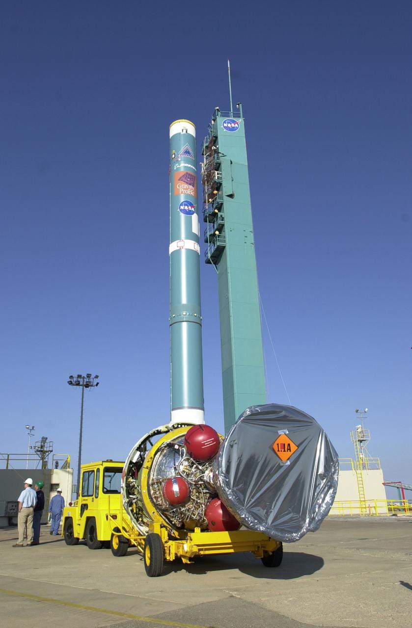VANDENBERG AFB, CALIF. -  The second stage of the Delta II launch vehicle for the Gravity Probe B experiment arrives at the mobile service tower on Space Launch Complex 2, Vandenberg Air Force Base, Calif.  The Gravity Probe B will launch a payload of four gyroscopes into low-Earth polar orbit to test two extraordinary predictions of Albert Einstein’s general theory of relativity: the geodetic effect (how space and time are warped by the presence of the Earth) and frame dragging (how Earth’s rotation drags space and time around with it). Once in orbit, for 18 months each gyroscope’s spin axis will be monitored as it travels through local spacetime, observing and measuring these effects.  The experiment was developed by Stanford University, Lockheed Martin and NASA’s Marshall Space Flight Center.  The targeted launch date is Dec. 6, 2003.