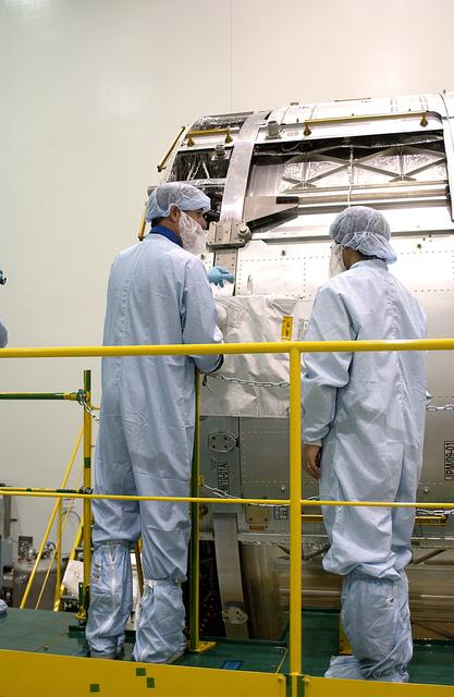 NASA image: KENNEDY SPACE CENTER, FLA. -  In the Space Station Processing Facility, STS-117 Mission Specialist James Reilly works with the Japanese Experiment Module (JEM).  Reilly and STS-115 Mission Specialist Joseph Tanner are at KSC for equipment familiarization, a routine part of astronaut training and launch preparations.