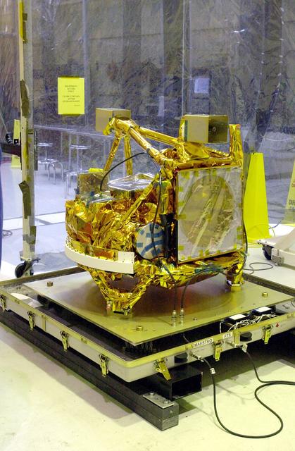 NASA image: VANDENBERG AIR FORCE BASE, CALIF. - The SciSat-1 spacecraft is revealed at Vandenberg Air Force Base, Calif.   Sci-Sat, which will undergo instrument checkout and spacecraft functional testing, weighs approximately 330 pounds and after launch will be placed in a 400-mile-high polar orbit to investigate processes that control the distribution of ozone in the upper atmosphere. The data from the satellite will provide Canadian and international scientists with improved measurements relating to global ozone processes and help policymakers assess existing environmental policy and develop protective measures for improving the health of our atmosphere, preventing further ozone depletion. The mission is designed to last two years.