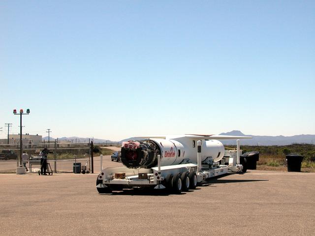 NASA image: VANDENBERG AIR FORCE BASE, CALIF. - At Vandenberg Air Force Base, Calif., the Pegasus launch vehicle is moved toward its hangar. The Pegasus will carry the SciSat-1 spacecraft in a 400-mile-high polar orbit to investigate processes that control the distribution of ozone in the upper atmosphere. The data from the satellite will provide Canadian and international scientists with improved measurements relating to global ozone processes and help policymakers assess existing environmental policy and develop protective measures for improving the health of our atmosphere, preventing further ozone depletion. The mission is designed to last two years.
