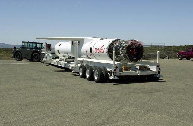 NASA image: VANDENBERG AIR FORCE BASE, CALIF. - At Vandenberg Air Force Base, Calif., the Pegasus launch vehicle is moved toward its hangar. The Pegasus will carry the SciSat-1 spacecraft in a 400-mile-high polar orbit to investigate processes that control the distribution of ozone in the upper atmosphere. The data from the satellite will provide Canadian and international scientists with improved measurements relating to global ozone processes and help policymakers assess existing environmental policy and develop protective measures for improving the health of our atmosphere, preventing further ozone depletion. The mission is designed to last two years.
