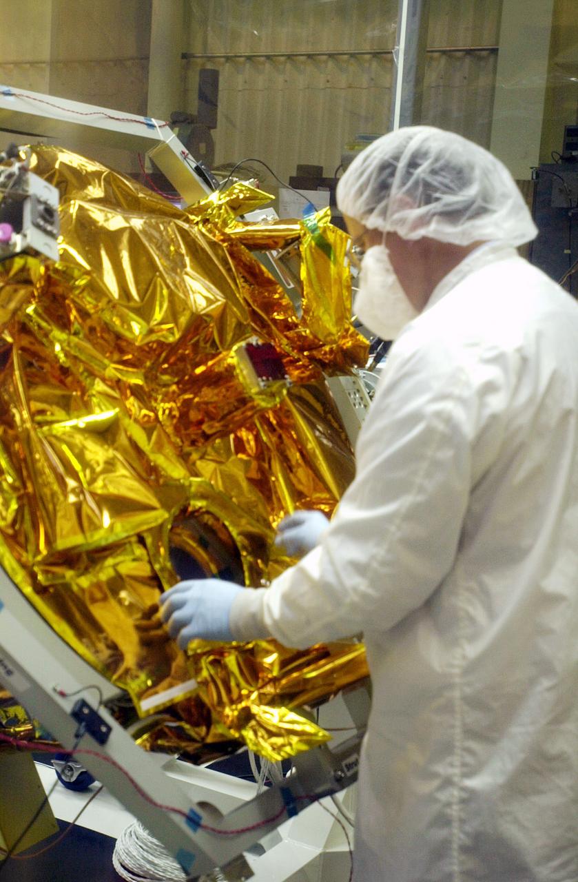 VANDENBERG AIR FORCE BASE, CALIF.- At Vandenberg Air Force Base, Calif., spacecraft functional testing is underway on the SciSat-1. The solar arrays are being attached and the communications systems are also being checked out.   The SciSat-1 weighs approximately 330 pounds and after launch will be placed in a 400-mile-high polar orbit to investigate processes that control the distribution of ozone in the upper atmosphere. The data from the satellite will provide Canadian and international scientists with improved measurements relating to global ozone processes and help policymakers assess existing environmental policy and develop protective measures for improving the health of our atmosphere, preventing further ozone depletion. The mission is designed to last two years.