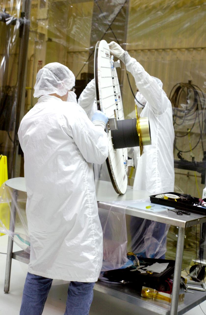 VANDENBERG AIR FORCE BASE, CALIF.- At Vandenberg Air Force Base, Calif., spacecraft functional testing is underway on the SciSat-1. The solar arrays are being attached and the communications systems are also being checked out.   The SciSat-1 weighs approximately 330 pounds and after launch will be placed in a 400-mile-high polar orbit to investigate processes that control the distribution of ozone in the upper atmosphere. The data from the satellite will provide Canadian and international scientists with improved measurements relating to global ozone processes and help policymakers assess existing environmental policy and develop protective measures for improving the health of our atmosphere, preventing further ozone depletion. The mission is designed to last two years.