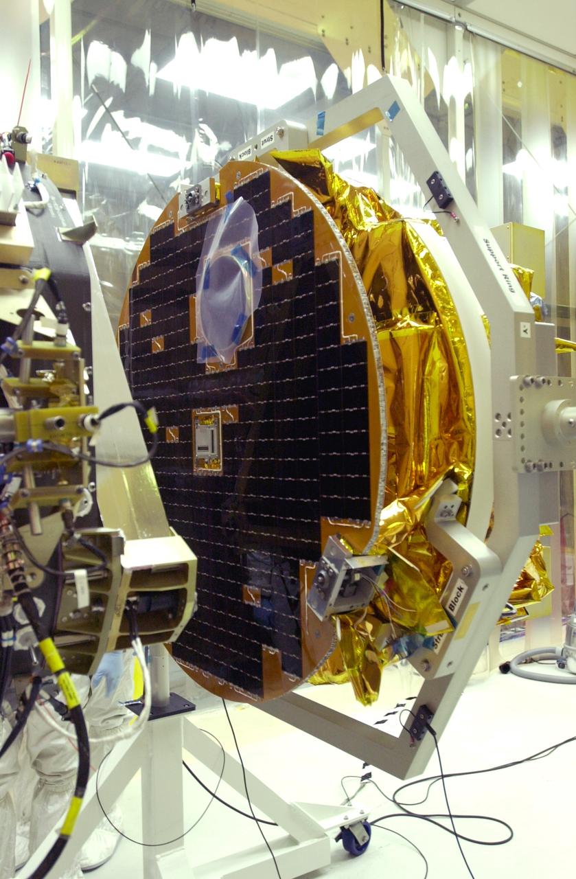 VANDENBERG AIR FORCE BASE, CALIF. -  At Vandenberg AFB, Calif., a solar array is tested before installing on the SciSat-1 spacecraft.  The SciSat-1 weighs approximately 330 pounds and after launch will be placed in a 400-mile-high polar orbit to investigate processes that control the distribution of ozone in the upper atmosphere. The data from the satellite will provide Canadian and international scientists with improved measurements relating to global ozone processes and help policymakers assess existing environmental policy and develop protective measures for improving the health of our atmosphere, preventing further ozone depletion. The mission is designed to last two years.