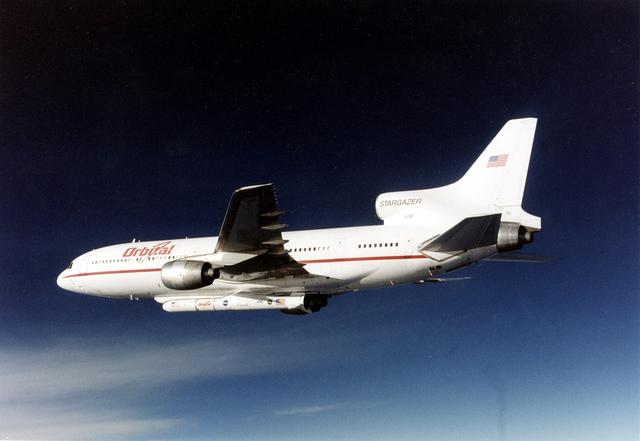 NASA image: VANDENBERG AIR FORCE BASE, CALIF. -  The L-1011 carrier aircraft is in flight with its cargo of the Pegasus launch vehicle and SciSat-1 spacecraft underneath.  The SciSat-1 weighs approximately 330 pounds and after launch will be placed in a 400-mile-high polar orbit to investigate processes that control the distribution of ozone in the upper atmosphere. The data from the satellite will provide Canadian and international scientists with improved measurements relating to global ozone processes and help policymakers assess existing environmental policy and develop protective measures for improving the health of our atmosphere, preventing further ozone depletion. The mission is designed to last two years.