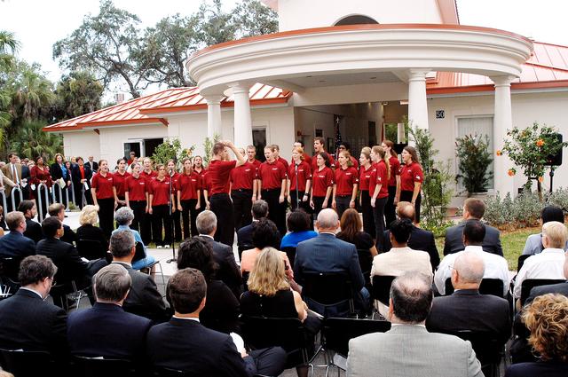 NASA image: KENNEDY SPACE CENTER, FLA. -  Family members of the STS-107 astronauts and other dignitaries attending the Columbia Village dedication ceremony at the Florida Institute of Technology in Melbourne, Fla., enjoy a rendition of "God Bless America" by the university's Players in Harmony.  Each of the seven new residence halls in the complex is named for one of the STS-107 astronauts who perished during the Columbia accident -- Rick Husband, Willie McCool, Laurel Clark, Michael Anderson, David Brown, Kalpana Chawla, and Ilan Ramon.