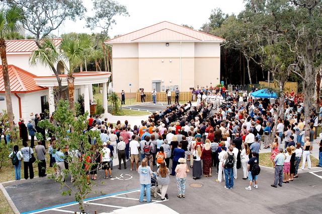 NASA image: KENNEDY SPACE CENTER, FLA. -  Family members of the STS-107 astronauts, other dignitaries, members of the university community and the public gather for the dedication ceremony of the Columbia Village at the Florida Institute of Technology in Melbourne, Fla.  Each of the seven new residence halls in the complex is named for one of the STS-107 astronauts who perished during the Columbia accident -- Rick Husband, Willie McCool, Laurel Clark, Michael Anderson, David Brown, Kalpana Chawla, and Ilan Ramon.