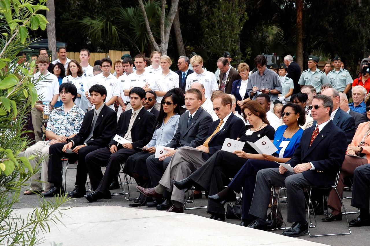 KENNEDY SPACE CENTER, FLA. -- Family members of the STS-107 astronauts and other dignitaries gather for the dedication ceremony of the Columbia Village at the Florida Institute of Technology in Melbourne, Fla.  Each of the seven new residence halls in the complex is named for one of the STS-107 astronauts who perished during the Columbia accident -- Rick Husband, Willie McCool, Laurel Clark, Michael Anderson, David Brown, Kalpana Chawla, and Ilan Ramon.